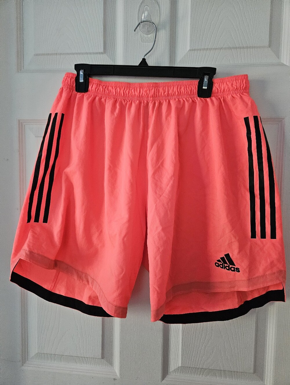 adidas Women’s Neon Coral Athletic Shorts with Black Stripes